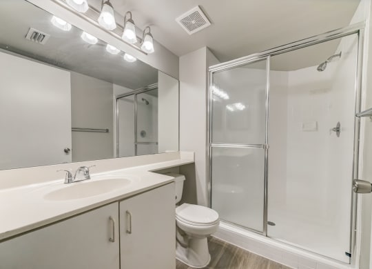 Bathroom with walk in shower, toilet and sink at Pembroke Pines Landings, Pembroke Pines, FL, 33025