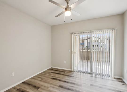living room with large window at Sweetwater At Metro North Apartments, Arizona 85029