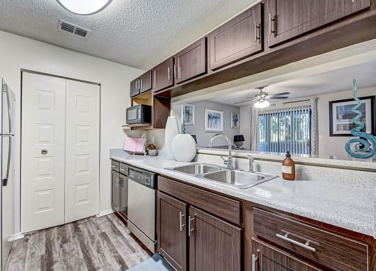 our apartments have a modern kitchen with stainless steel appliances at St. Johns Forest Apartments, Florida, 32277