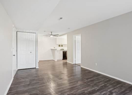 A room with a wooden floor and white walls. at Millennium at Creve Coeur, Creve Coeur
