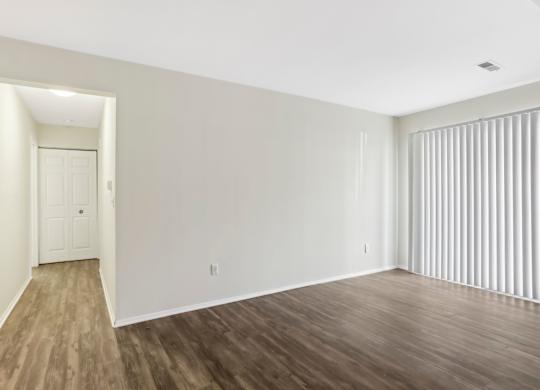 A room with wooden floors and white walls. at Millennium at Creve Coeur, Missouri, 63141