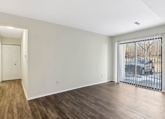 A room with wooden floors and white walls. at Millennium at Creve Coeur, Missouri, 63141