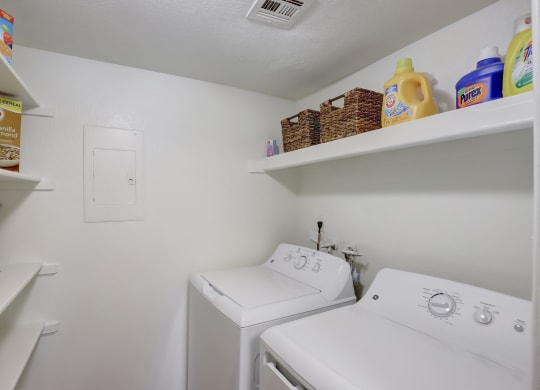 a laundry room with a washer and dryer at Glen at Mesa Apartments, Arizona 85201