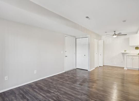 A room with a wooden floor and white walls.at Creve Coeur, Creve Coeur, MO