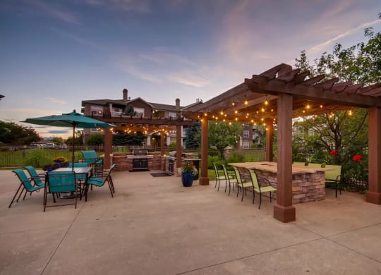 a patio with patio furniture and a pavilion with lights at Heritage at Stone Mountain, Northglenn, CO, 80233