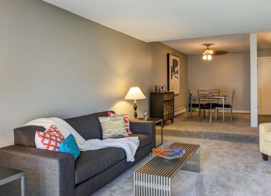 Living Area With Kitchen View at Glen at Burnsville, Burnsville