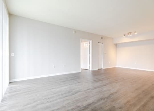 a bedroom with hardwood flooring at the oxford at estonia apartments in san an at Heritage Bay, Florida, 34957