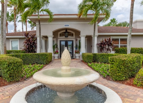 a fountain in front of a house at Heritage Bay, Jensen Beach, FL 34957