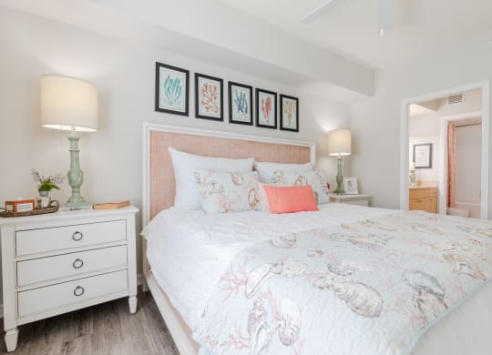 a bedroom with a bed and two night stands at Heritage Bay, Florida