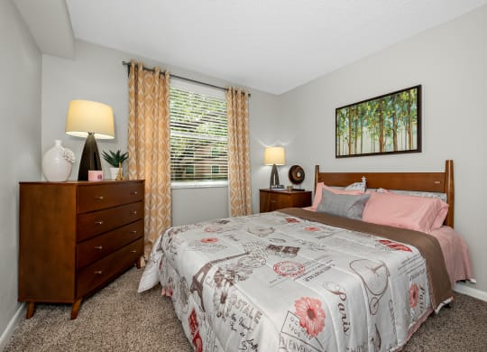 Bedroom with nightstand with lamps at Pembroke Pines Landings, Pembroke Pines, FL, 33025