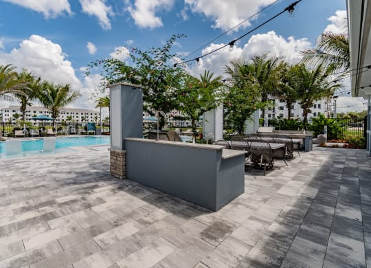 Poolside Grill and Picnic Tables at Edge75, Naples, Florida 34104
