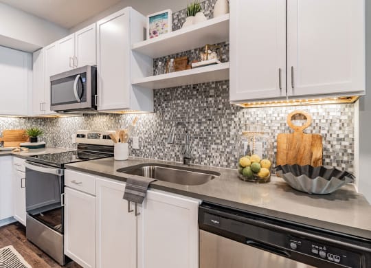 Custom Cabinetry with Under Mounted Lighting at Edge75, Naples, FL