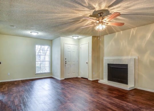 Living Room with Fireplace at The Glen, Lewisville, TX