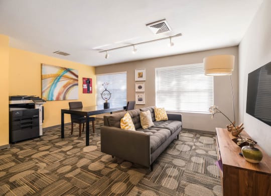 Clubhouse with TV at University Park Apartments, Florida