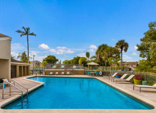 Swimming Pool With Relaxing Sundecks at Water's Edge, Florida