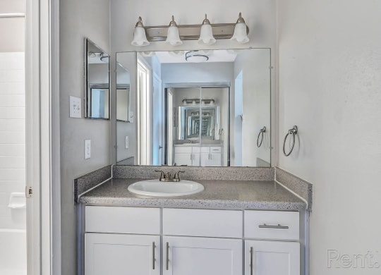 Bathroom with Vanity at The Willows on Rosemeade, Texas 75287