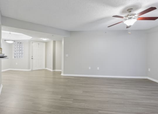 an empty living room with a ceiling fan at Pembroke Pines Landings, Pembroke Pines, FL 33025