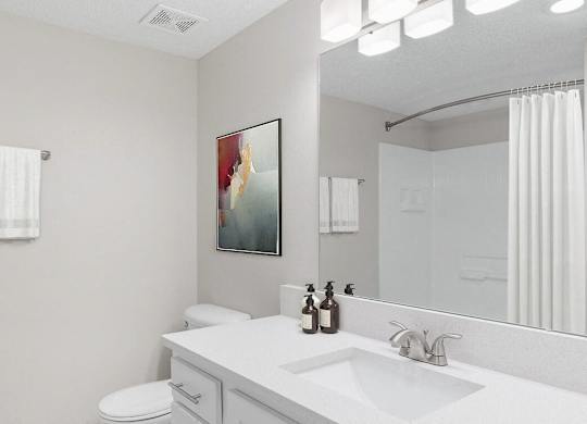 a white bathroom with a sink and a mirror at Lakeside Villas, Orlando, 32817