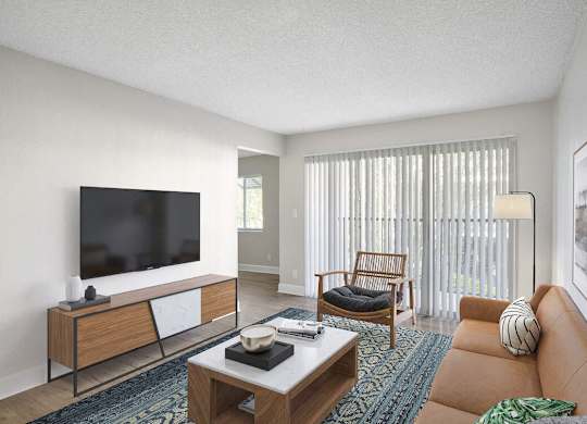 a living room with a couch and a television at Lakeside Villas, Orlando, FL 32817