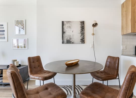 Dining table with leather seating.