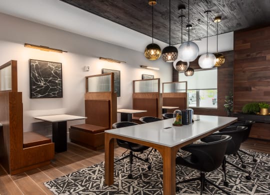Resident lounge with individual booths  at Chapter at the Streets of St Charles, Saint Charles, Missouri