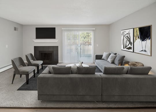 Model Living Room with Fireplace and Carpet at Waterfront Apartments in Lakewood, CO.