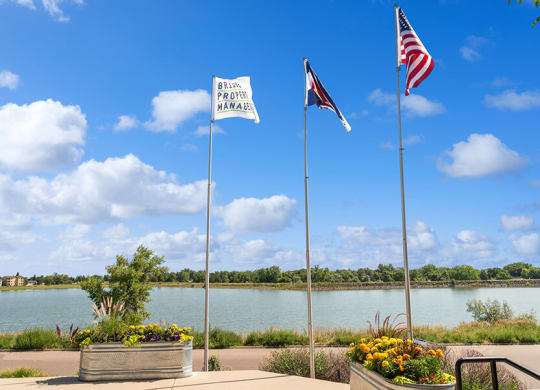 Community Patio Area with view of Lake at Waterfront Apartments in Lakewood, CO.