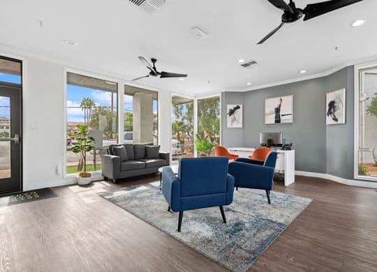 Community Clubhouse with Lounge Furniture at Crystal Creek Apartments in Phoenix, AZ.