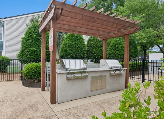 Outdoor BBQ Area with Canopy at Park 2300 Apartments in Charlotte, NC.
