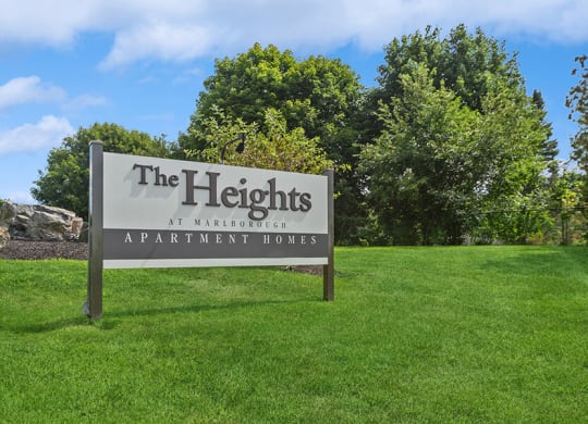 Monument Sign and Front Entrance at Heights Marlborough Apartments in Boston, MA.