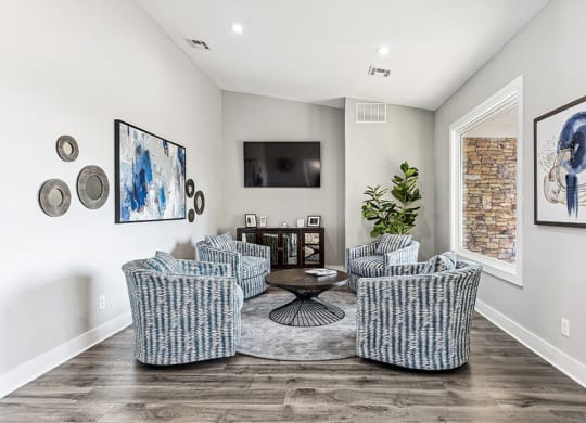 Community Clubhouse with Lounge Furniture and Coffee Bar at Paramont Apartments in Duluth, GA.