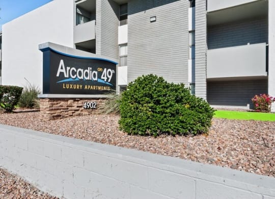 Property entrance sign and buildings