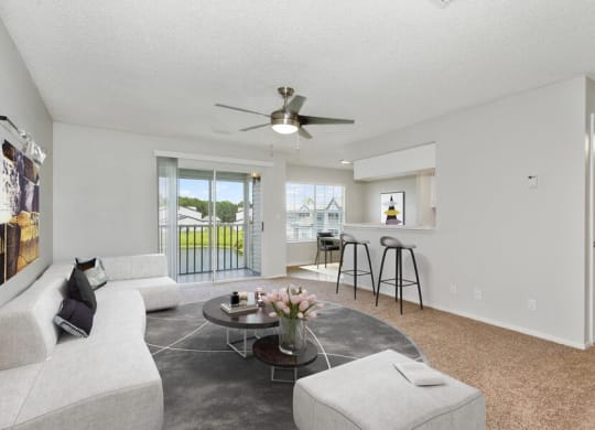 Model living room with kitchen