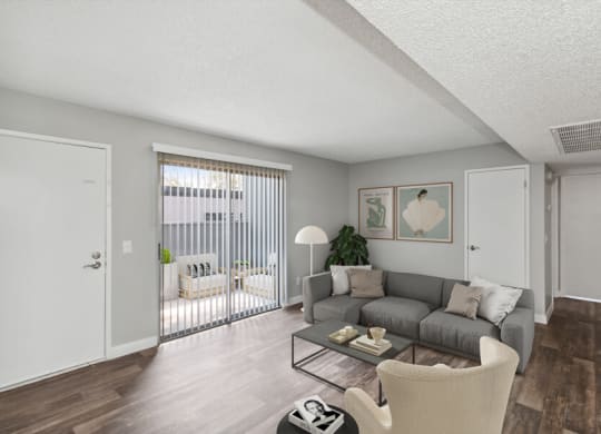 Model living room of an apartment with a couch and a coffee table