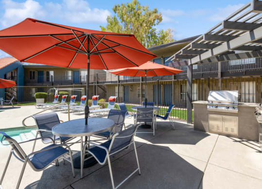 lounge area near the pool at Villages at Metro Center, Phoenix, Arizona