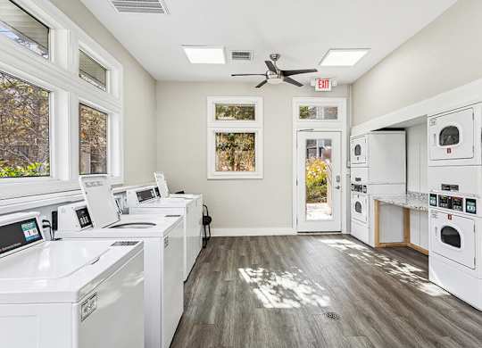 Community Laundry Center with Washing Machines and Dryers at Element 41 Apartments located in Marietta, GA.