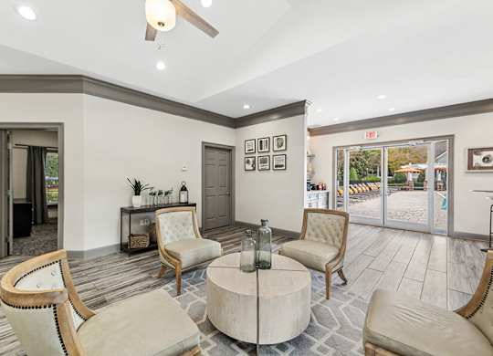 Community Clubhouse with Lounge Furniture at Lake Cameron Apartments located in Apex, NC.
