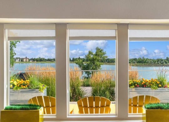 View of Community Lake at Waterfront Apartments in Lakewood, CO.