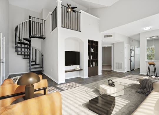 Model living room with spiral staircase