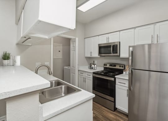Model kitchen with stainless steel appliances
