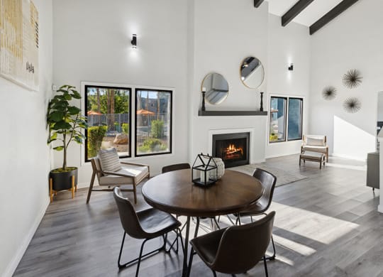 Community Clubhouse with Lounge Furniture and Fireplace at Tanque Verde Apartments located in Tucson, AZ.