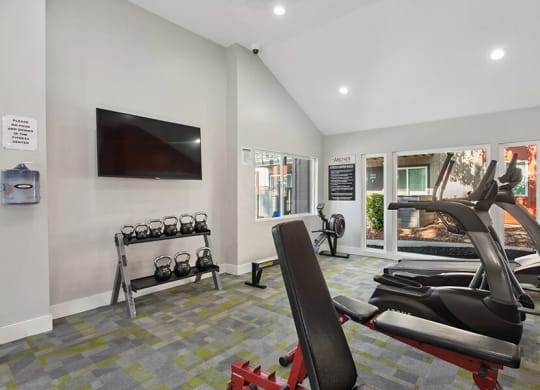 Community Fitness Center with Equipment at The Archer Apartments in Sacramento, CA.
