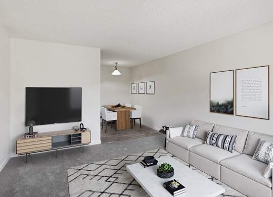 Model Living Room with Carpet and View of Dining Room at Walnut Creek Apartments located in Walnut Creek, CA.