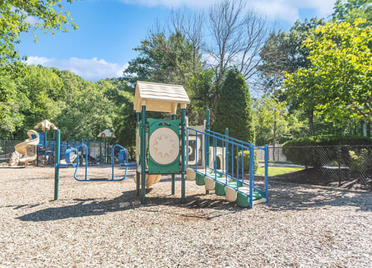 Community Playground with Slide at The Commons at Haynes Farm Apartments in Boston, MA.