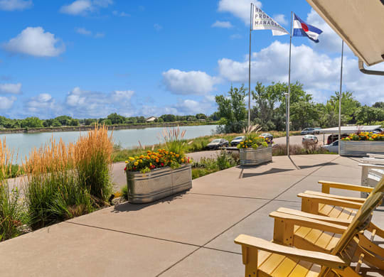 Community Patio Area with view of Lake at Waterfront Apartments in Lakewood, CO.