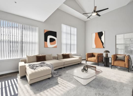 Model living room showcasing large windows