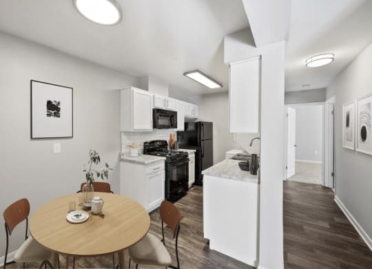 Model dining area next to kitchen