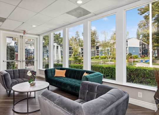 Community Clubhouse with Lounge Furniture at Fountains at Point West Apartments in Sacramento, CA.