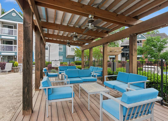 Outdoor Picnic Area with Lounge Furniture and Canopy at Park 2300 Apartments in Charlotte, NC.