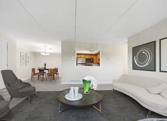 Model Living Room and Dining Room Area with Carpet at Heights Marlborough Apartments in Boston, MA.